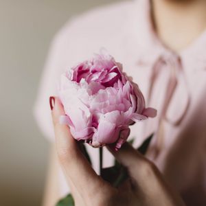 Preview wallpaper peony, flower, hand, tenderness