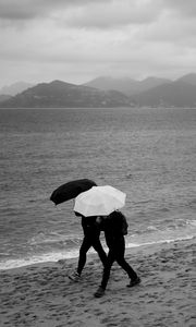 Preview wallpaper people, umbrellas, rain, sea, beach