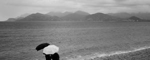 Preview wallpaper people, umbrellas, rain, sea, beach