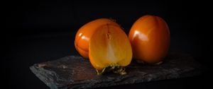 Preview wallpaper persimmon, fruit, ripe, slice