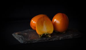 Preview wallpaper persimmon, fruit, ripe, slice