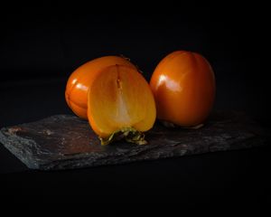 Preview wallpaper persimmon, fruit, ripe, slice