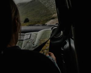 Preview wallpaper person, map, travel, car