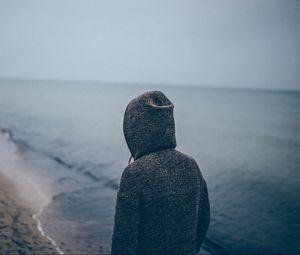 Preview wallpaper person, silhouette, alone, sad, hood, beach, sea