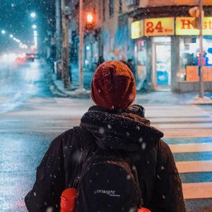 Preview wallpaper person, street, night, snow, city
