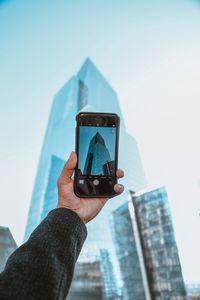 Preview wallpaper phone, camera, hand, building, city