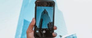Preview wallpaper phone, camera, hand, building, city