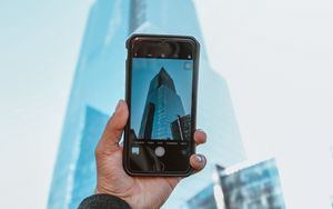 Preview wallpaper phone, camera, hand, building, city