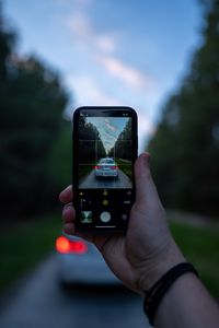 Preview wallpaper phone, camera, hand, car