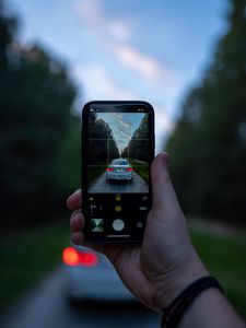 Preview wallpaper phone, camera, hand, car