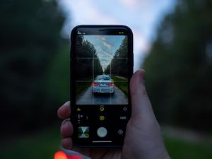 Preview wallpaper phone, camera, hand, car