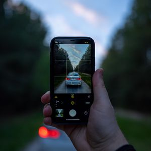 Preview wallpaper phone, camera, hand, car