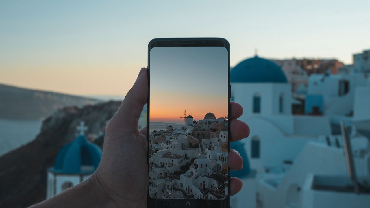 Wallpaper phone, hand, camera, city, sunset