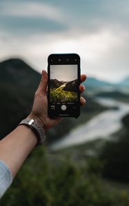 Preview wallpaper phone, hand, river, nature