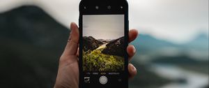 Preview wallpaper phone, hand, river, nature