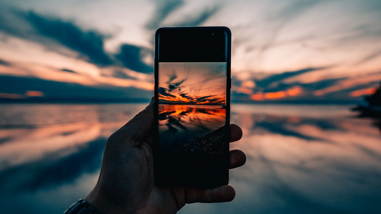 Wallpaper phone, hand, sunset, horizon