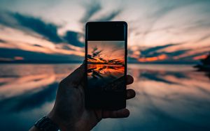 Preview wallpaper phone, hand, sunset, horizon