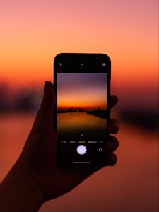 Preview wallpaper phone, hand, sunset, twilight, photo