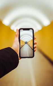 Preview wallpaper phone, hand, tunnel, perspective