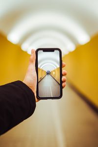 Preview wallpaper phone, hand, tunnel, perspective