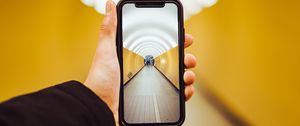 Preview wallpaper phone, hand, tunnel, perspective