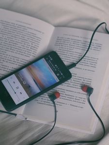 Preview wallpaper phone, headphones, book