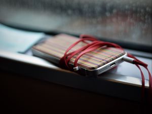 Preview wallpaper phone, headphones, device, music, window, rain