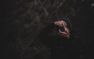 Preview wallpaper photographer, camera, hands, trees