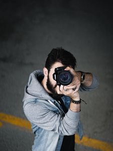 Preview wallpaper photographer, camera, man, lens, shooting