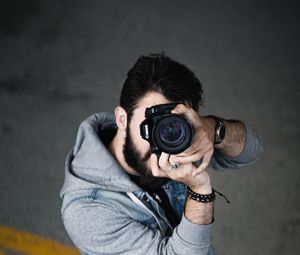 Preview wallpaper photographer, camera, man, lens, shooting