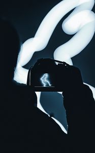 Preview wallpaper photographer, camera, rabbit, neon, dark