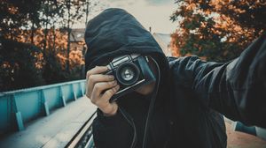 Preview wallpaper photographer, camera, selfie, hood, lens, hidden face