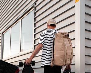 Preview wallpaper photographer, camera, skateboard, style, cap