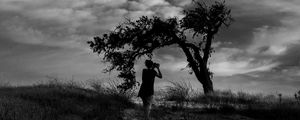 Preview wallpaper photographer, field, bw, wind, clouds, tree