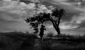 Preview wallpaper photographer, field, bw, wind, clouds, tree