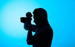 Preview wallpaper photographer, hood, camera, dark, shooting, blue