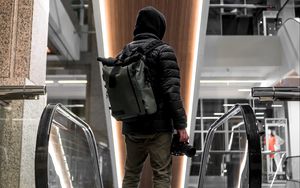 Preview wallpaper photographer, hood, escalator