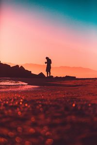 Preview wallpaper photographer, lonely, silhouette, sunset, pink