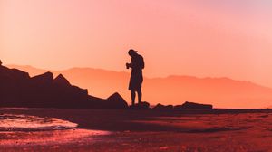 Preview wallpaper photographer, lonely, silhouette, sunset, pink