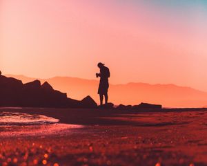 Preview wallpaper photographer, lonely, silhouette, sunset, pink