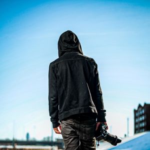 Preview wallpaper photographer, man, hood, camera