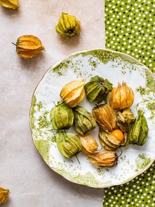 Preview wallpaper physalis, berries, fruits, plate