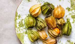 Preview wallpaper physalis, berries, fruits, plate