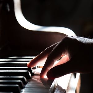 Preview wallpaper piano, hand, piano keys, shadow