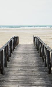 Preview wallpaper pier, beach, sea, coast, sand