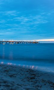 Preview wallpaper pier, beach, sunset, sea, coast, sand, horizon