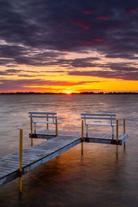 Preview wallpaper pier, bench, sea, sunset, horizon