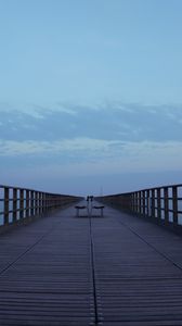 Preview wallpaper pier, benches, sea, clouds