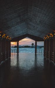 Preview wallpaper pier, boardwalk, ocean, palm trees, evening