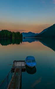 Preview wallpaper pier, boat, lake, mountains, twilight